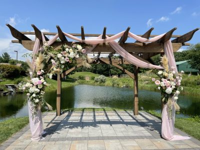 ceremony arch wedding flowers Bear Brook Valley