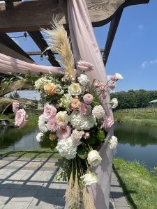 ceremony arch wedding flowers Bear Brook Valley
