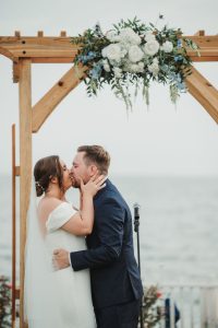 ceremony arch wedding flowersWater’s Edge