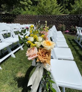 wedding detail chair flowers